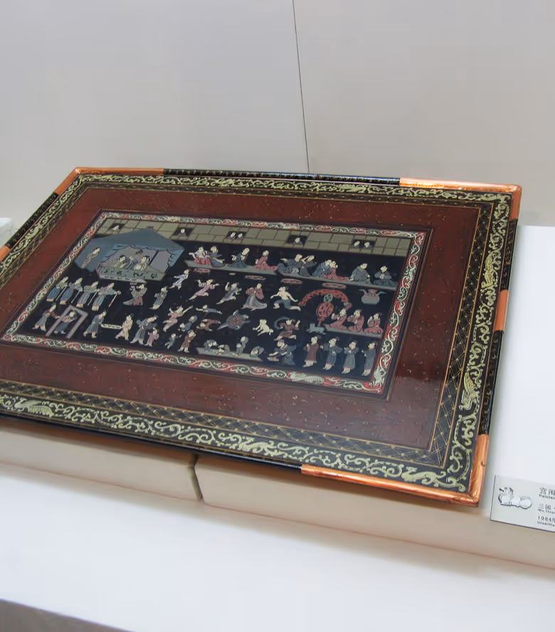 Black lacquered mirror back with four phoenixes, Tang dynasty